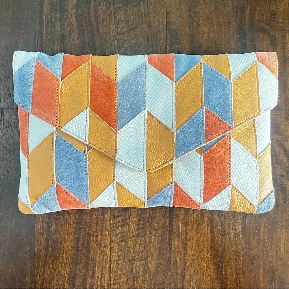 Multicolored leather clutch with a unique design #clutchbag
